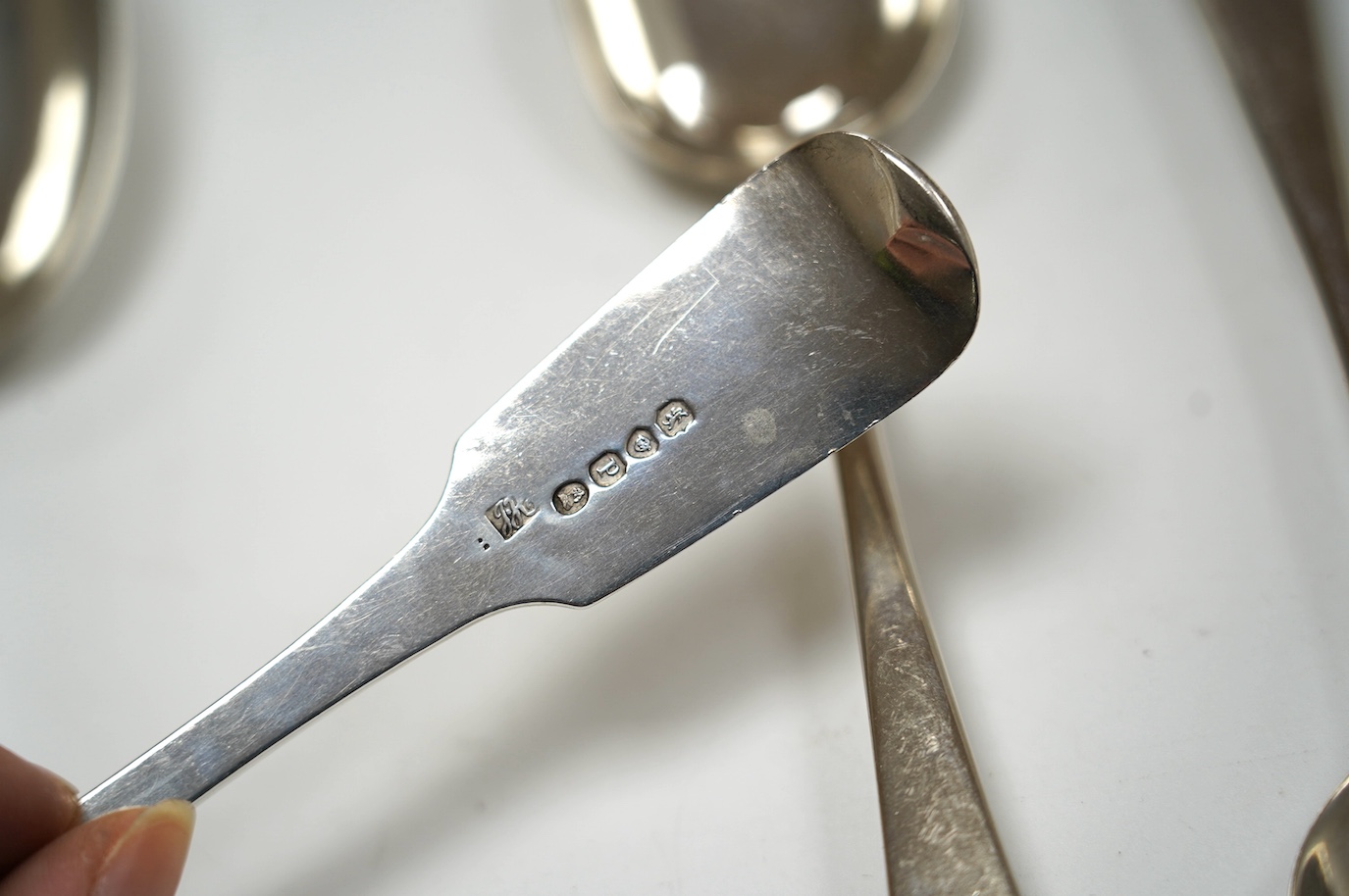 Six assorted 18th/19th century silver tablespoons, including pair of fiddle pattern by Jonathan Hayne, London, 1830 and Irish Old English pattern, Cristopher Skinner, Dublin, 1759, 13.1oz. Condition - fair